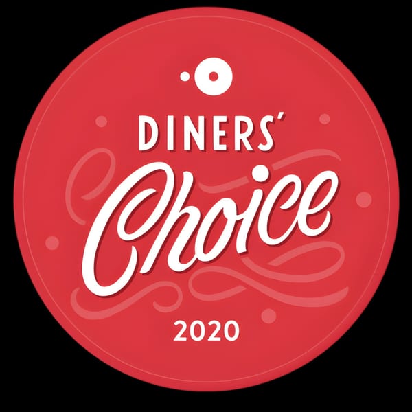 Red circular "Diners' Choice 2020" award logo with white text and decorative swirls.
